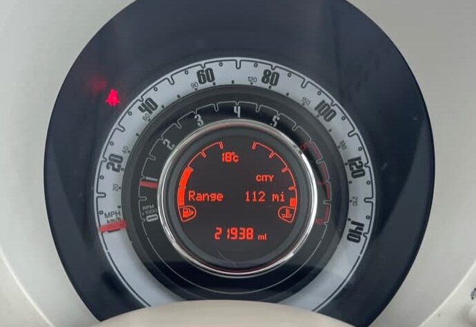 Finished Fiat 500 cluster in the car, display reading range, temperature and correct mileage